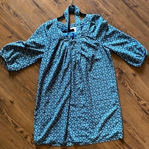 Knee length medium shirt with optional belt